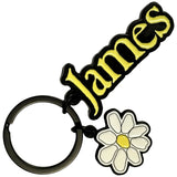 James: Yellow Logo White Daisy Charm Nøglering – officielt merchandise