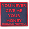 Billede af The Beatles Your Never Give Me Your Money Tøjmærke